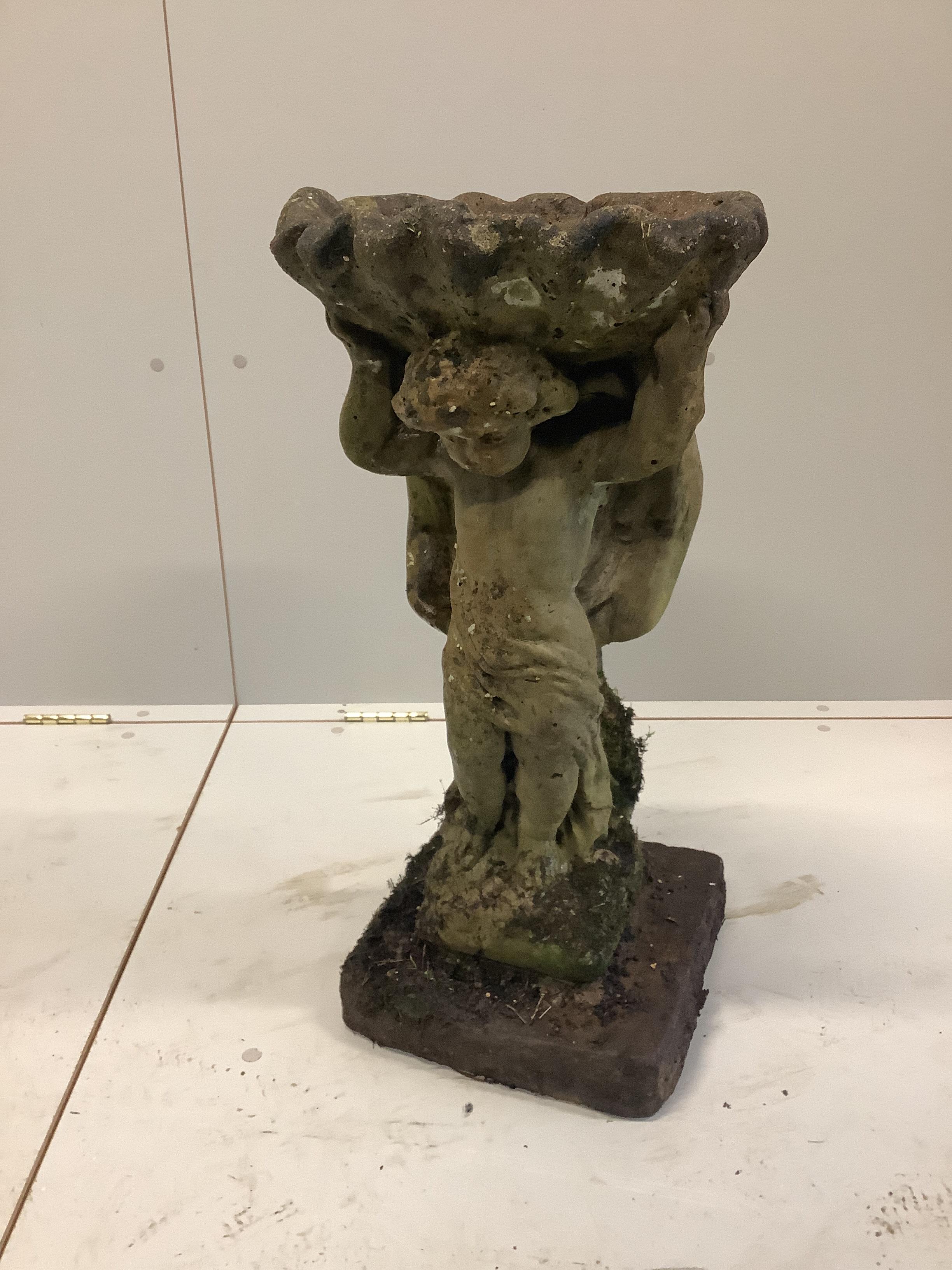 A reconstituted stone angel and scallop shell bird bath, height 66cm